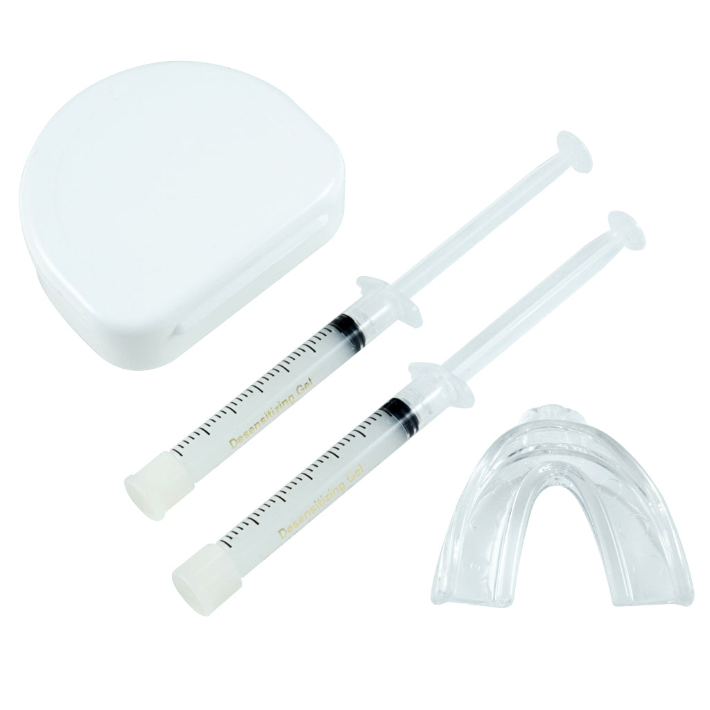 Tooth desensitizing kit including two syringes with desensitizing gel, a clear mouth tray, and a tray case.