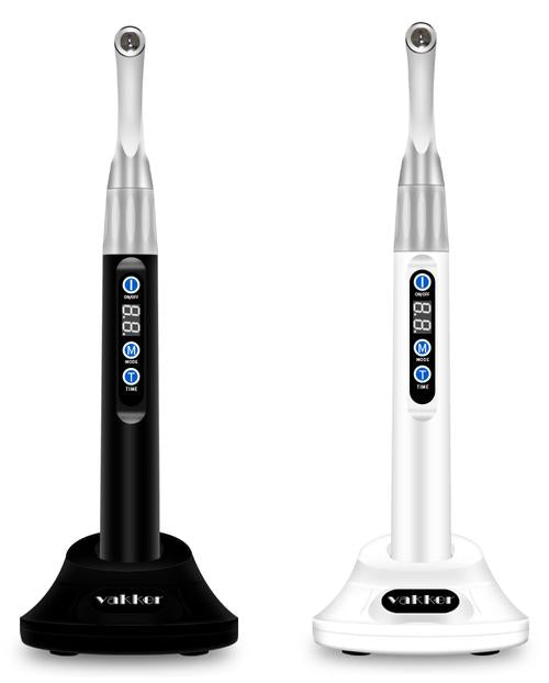 Vakker dental curing lamps in black and white on white background.