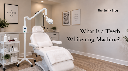 Pro40 LED teeth whitening machine beside a white treatment chair in a professional whitening studio with treatment supplies and protective eyewear.