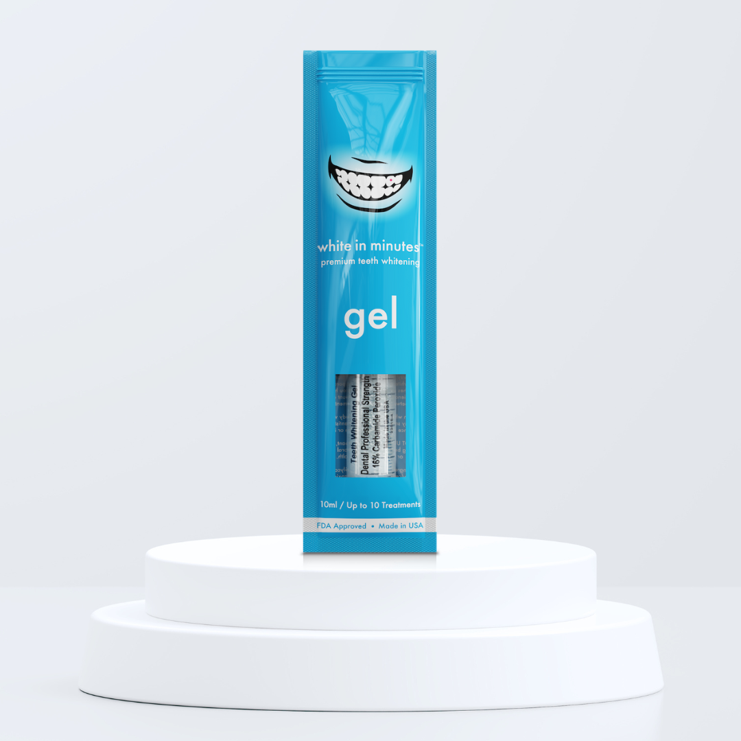Blue pouch of White in Minutes 16% carbamide peroxide tooth whitening gel on a white platform with a light gray background