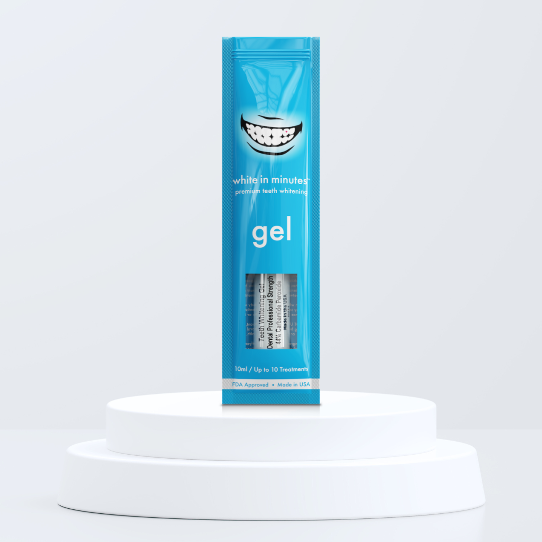 Blue pouch of White in Minutes 44% carbamide peroxide tooth whitening gel on a white platform with a light gray background