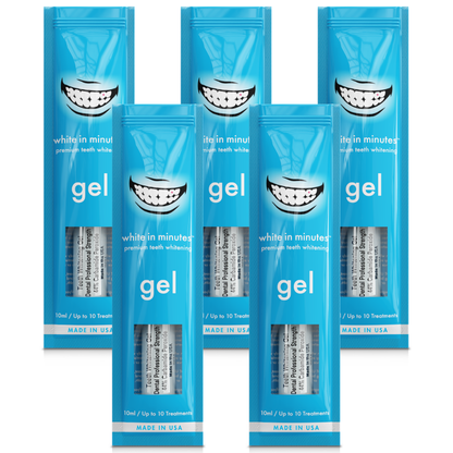 Five White in Minutes® 44% carbamide peroxide teeth whitening gel syringes and retail packages arranged on a white background, designed for use with whitening trays.