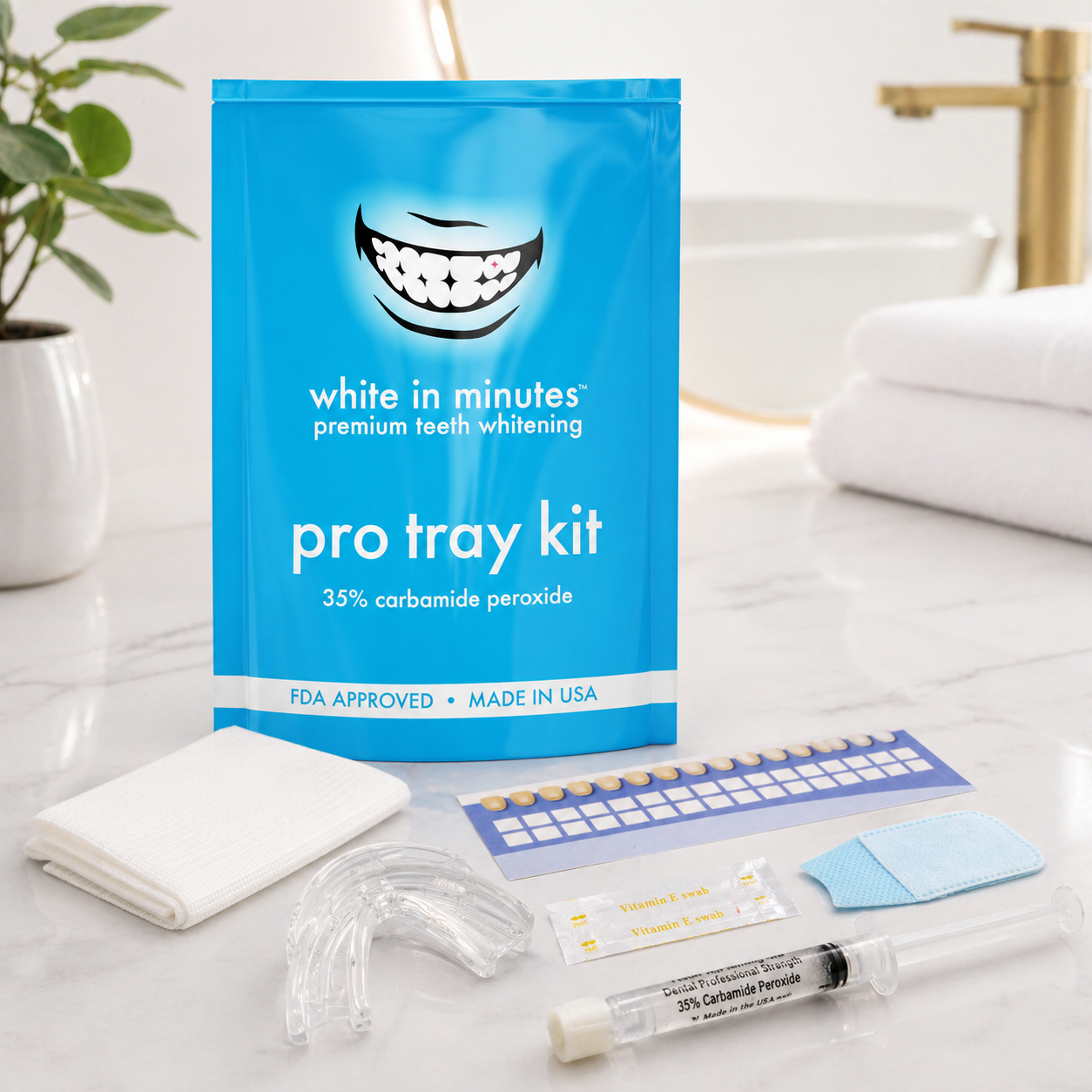 White in Minutes Pro Tray Kit displayed on a clean marble spa counter with professional teeth whitening components including 35% carbamide peroxide syringe, dual arch tray, vitamin E swabs, dental bib, shade guide, and wipes arranged neatly in a modern medspa setting.