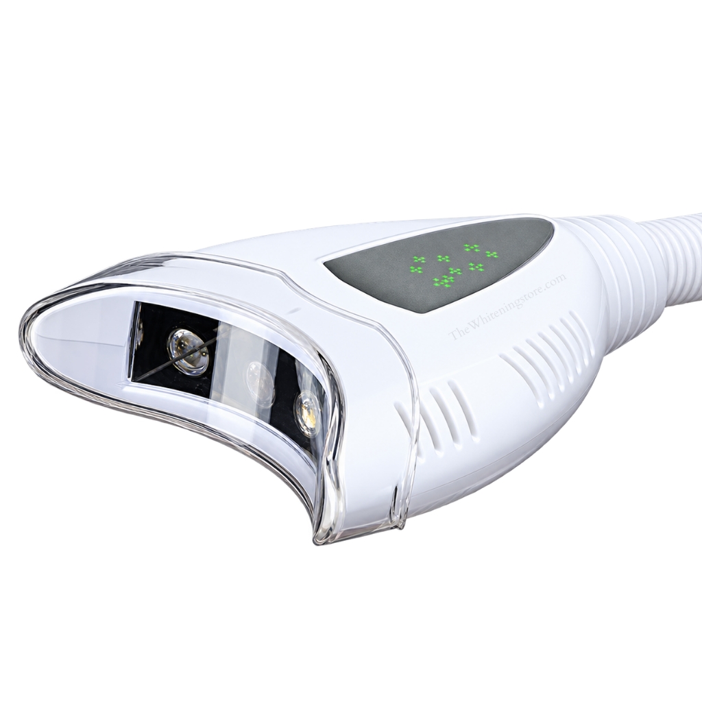 White pro20 teeth whitening lamp head shown at an angle on a white background, featuring a clear curved front shield, internal LED light components, side ventilation slots, ribbed neck, and a dark gray top control panel with green indicator lights.