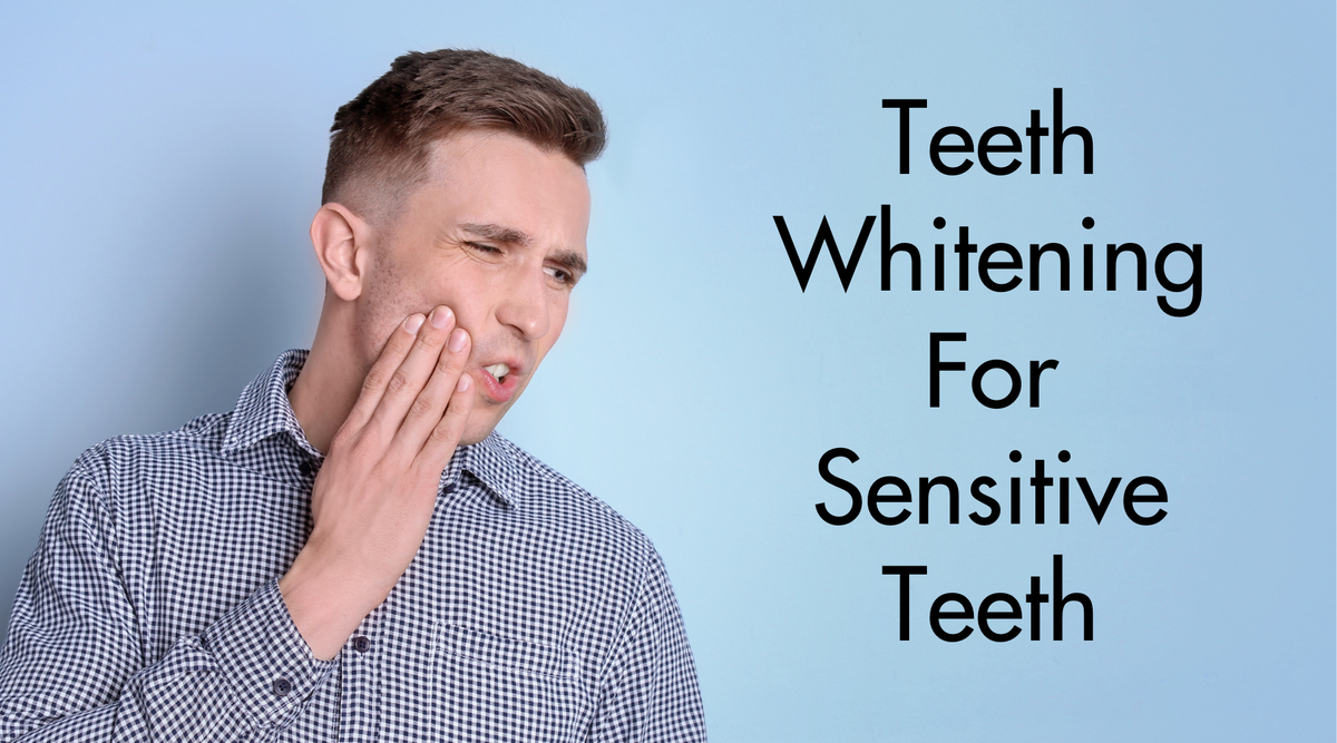 Image of man holding side of face with a painful expression on a blue background with text displayed for a connected blog post, titled "Teeth Whitening For Sensitive Teeth"