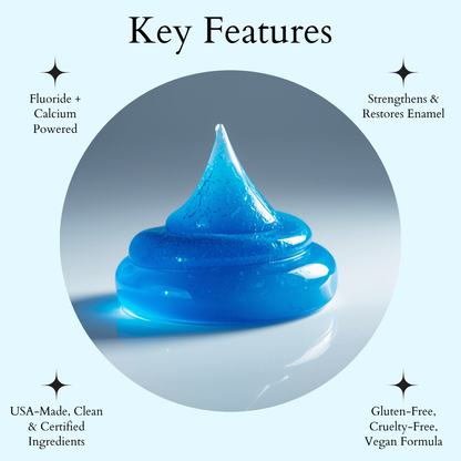 Close-up of a glossy blue gel swirl on a soft neutral background with text highlighting key features: fluoride and calcium powered, strengthens and restores enamel, USA-made clean ingredients, and vegan, cruelty-free, gluten-free formula.