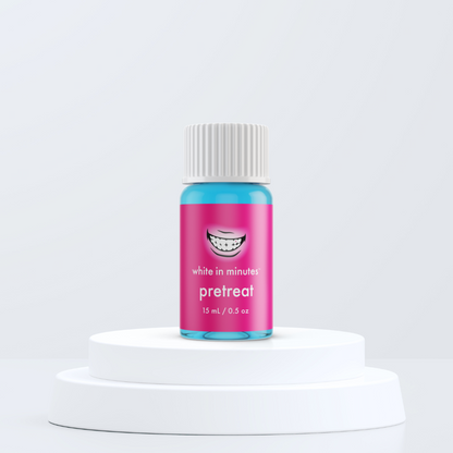 Bottle of White in Minutes PreTreat Stain Lifter on a white pedestal with a light gray background