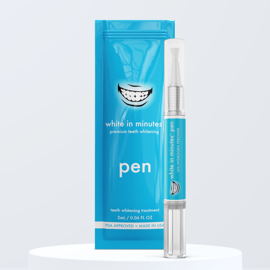 Teeth whitening pen with blue packaging on a light gray background and white pedestal