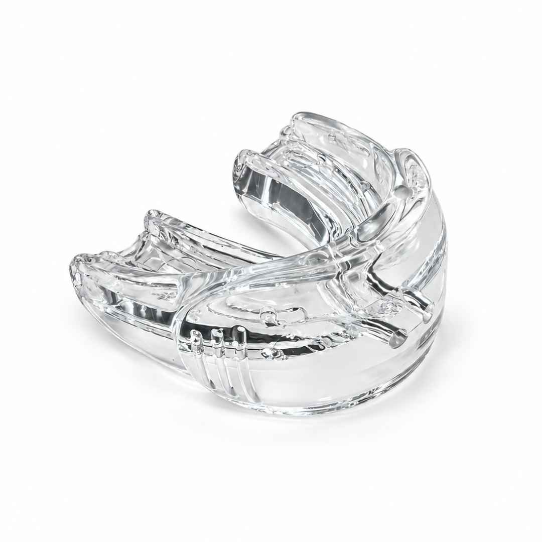 White in Minutes clear professional dual-arch teeth whitening tray with integrated lip bumper on a white background.